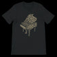 Black unisex calligraphy t-shirt featuring a bold Arabic piano design. Soft cotton streetwear tee perfect for music lovers and modern cultural fashion. DTG printing ready and ideal for self-expression.