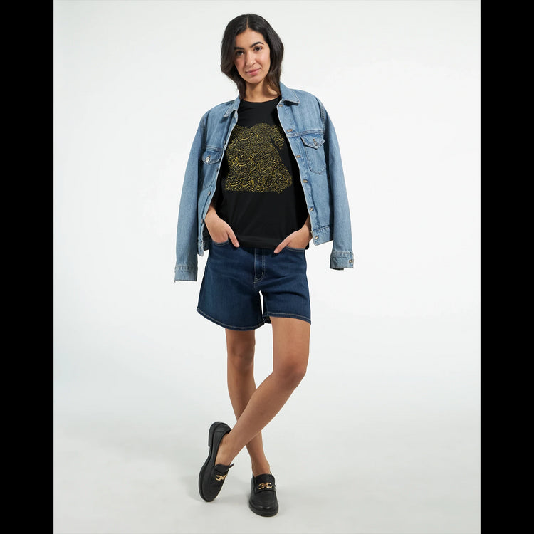 Woman wearing a black Egypt map calligraphy t-shirt with denim jacket.