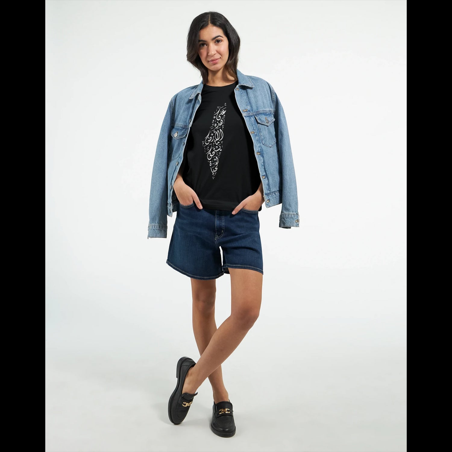 Black Palestine map t-shirt with bold Arabic script designed for activists and supporters of freedom movements. This high-quality cotton shirt offers a tailored unisex fit and is perfect for statement wear, heritage apparel, and political fashion under a print-on-demand model.