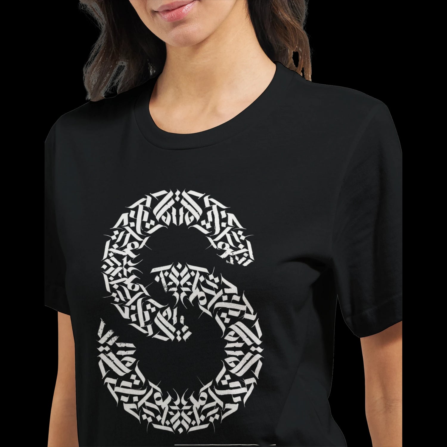 Black cultural calligraphy t-shirt showcasing powerful scripted strength in Arabic-inspired typography. Unisex cotton shirt for those who wear their heritage with pride. Ideal for Middle Eastern fashion, identity apparel, and personalized statement clothing.
