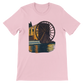 Pink animated landmark t-shirt showcasing the historic Hama WaterWheels of Syria in a modern illustrated design. Soft unisex cotton tee ideal for travelers, culture fans, and stylish casual wear. Designed for vibrant DTG printing and long-lasting comfort.